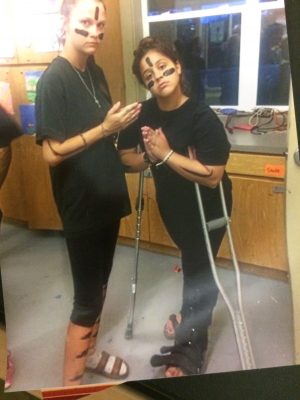 Emma Kypuros on crutches